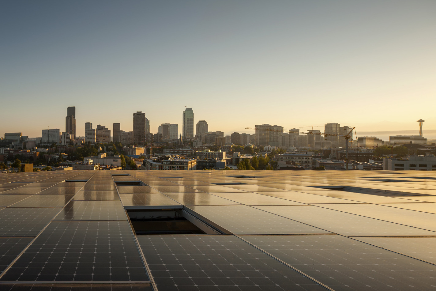 solar panels on the Bullitt Center overlooking the Seattle skyline